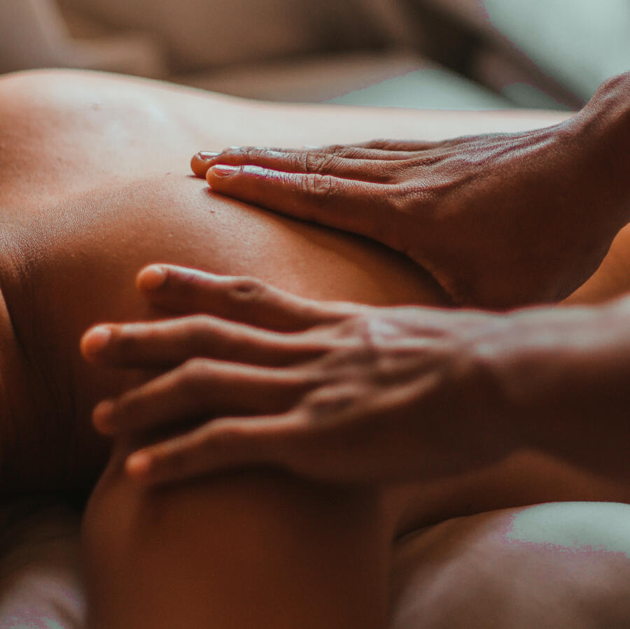 Picture of a back being massaged